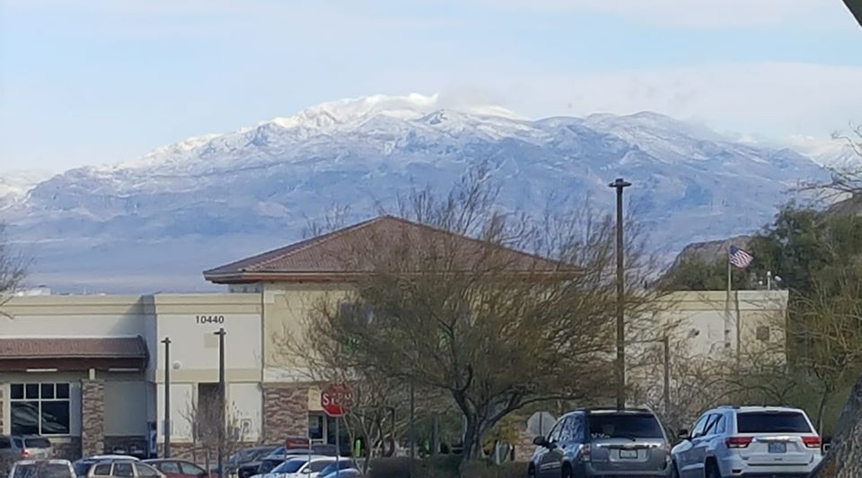 Las Vegas with snow covered mountains