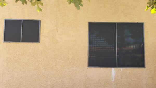 Daytime privacy black solar screens