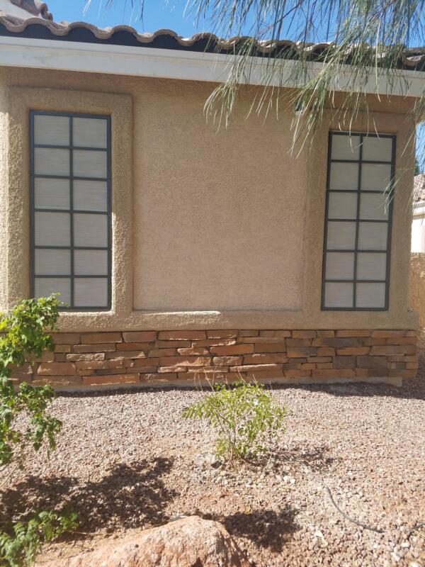 Multi grids with bronze frame and stucco screens in Henderson, NV