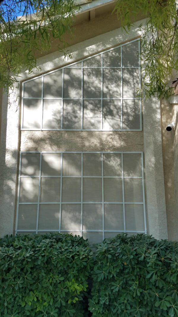 standard and irregular shaped windows with stucco 80% screens.